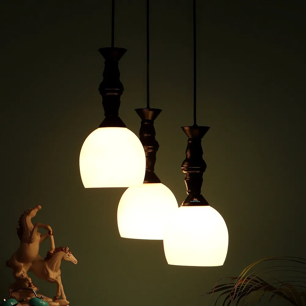Clustered Black Metal Hanging Lights with Cutdoom Glass