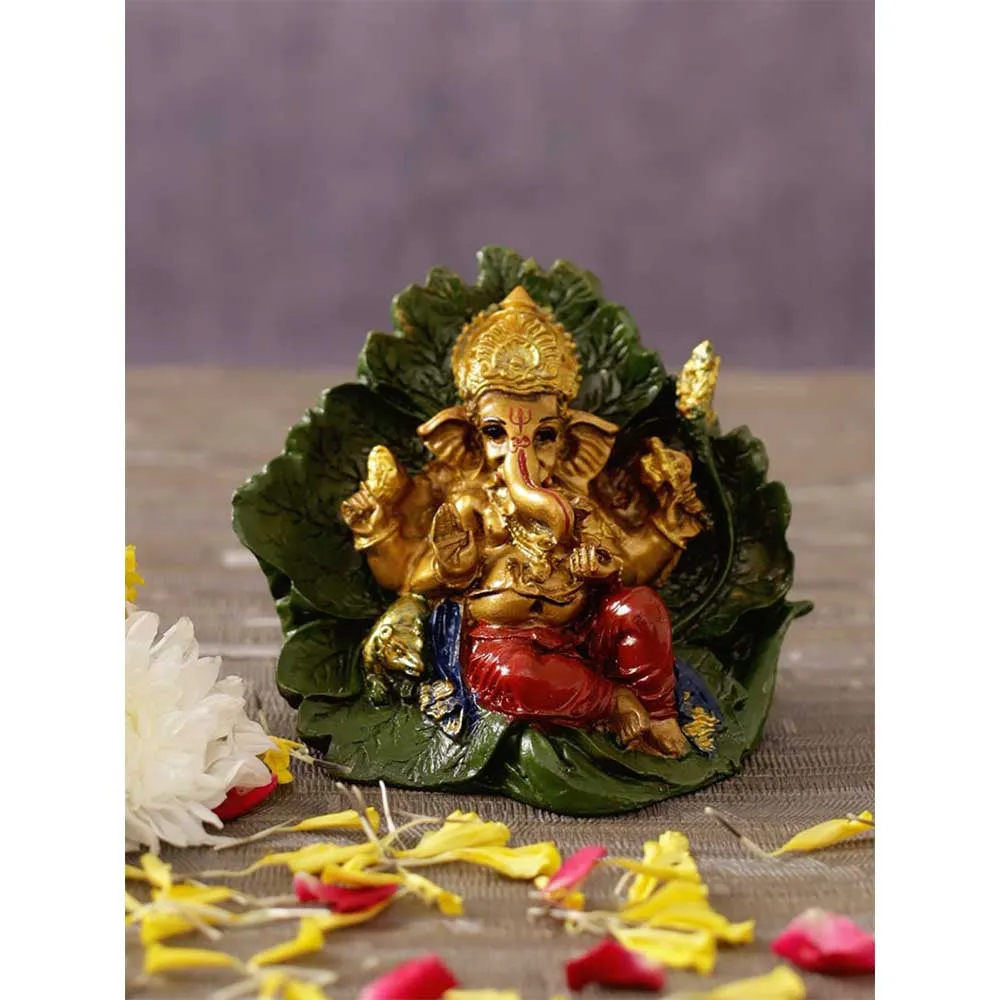 Gold Toned Lord Ganesha On Wide Green Leaf Decorative Showpiece