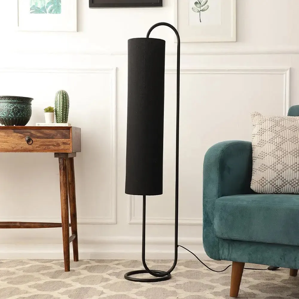 Graceful Black Curve Floor Lamp with Circular Base