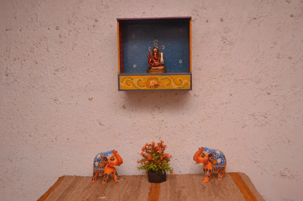 Handpainted and Carved Wooden Pooja Mandir in Light Blue and Yellow Colour