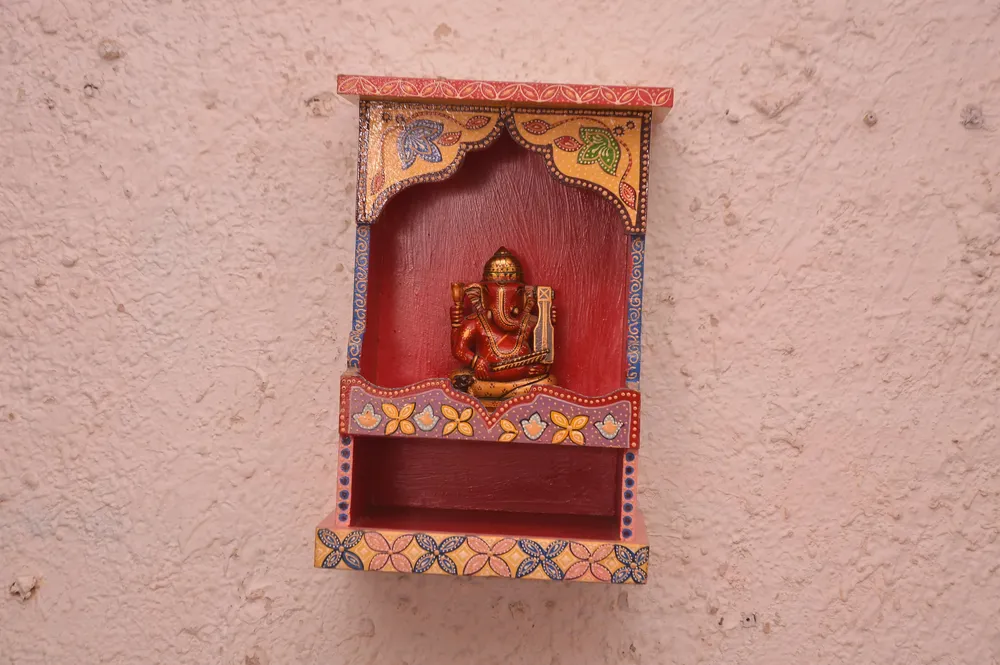Handpainted and Carved Wooden Pooja Mandir in Yellow Colour