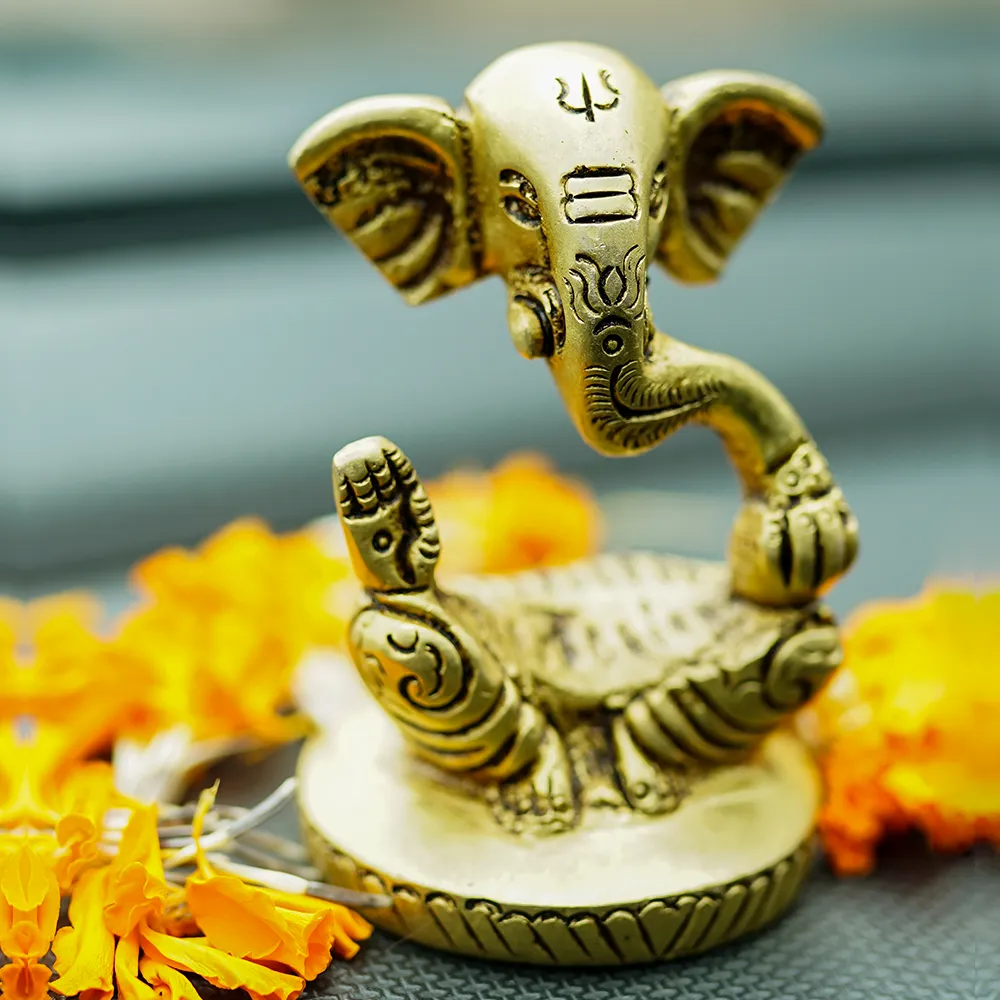 Lord Ganesha Brass Finish Handmade Sitting Idol Set Of 1