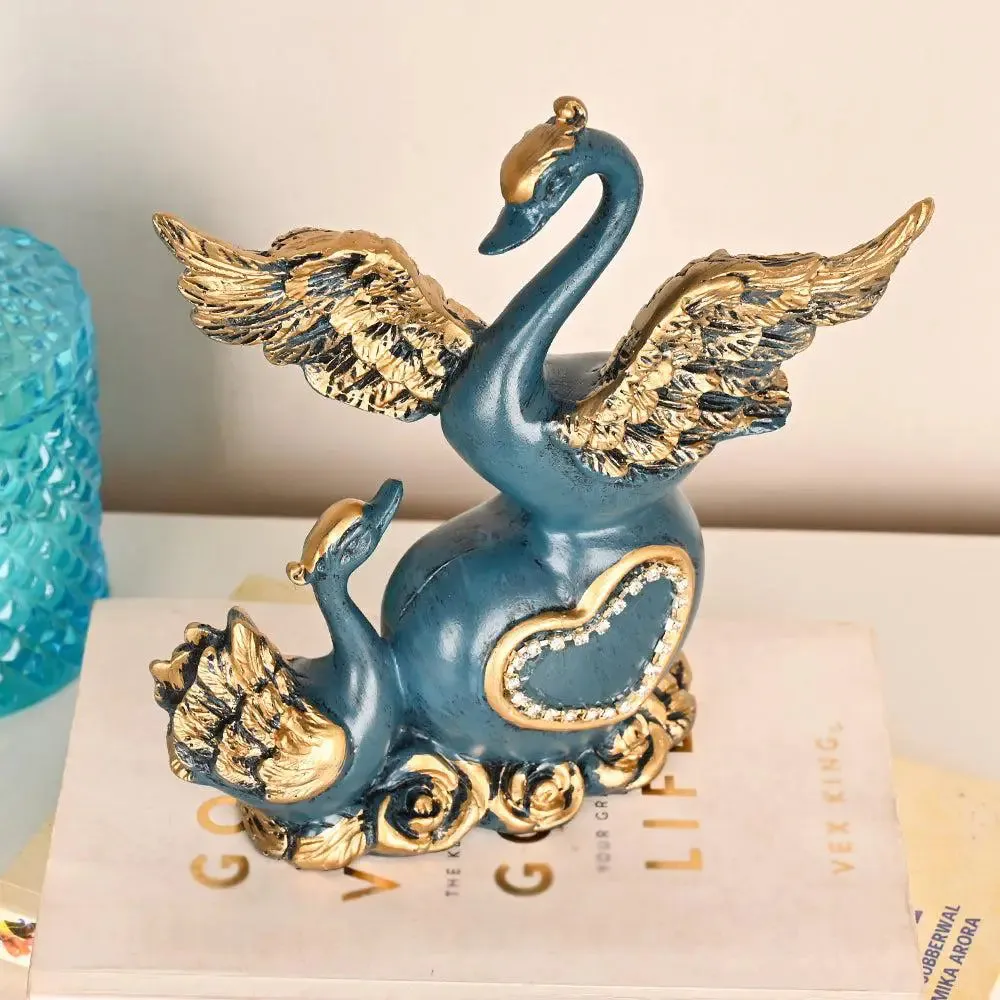 Love-evoking Blue Swan Statue with Luxurious Golden Accents