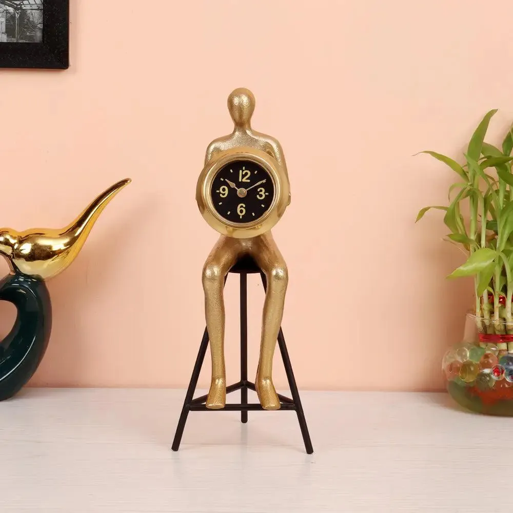 Shiny Golden Sitting Man Holding Clock Table Accent