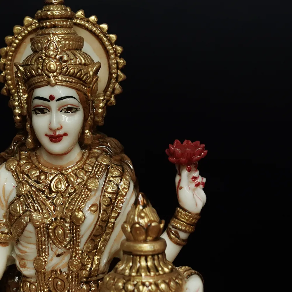 Skillfully Handcrafted Highly Detailed Divine Seated Goddess Laxmi Idol In Polyresin