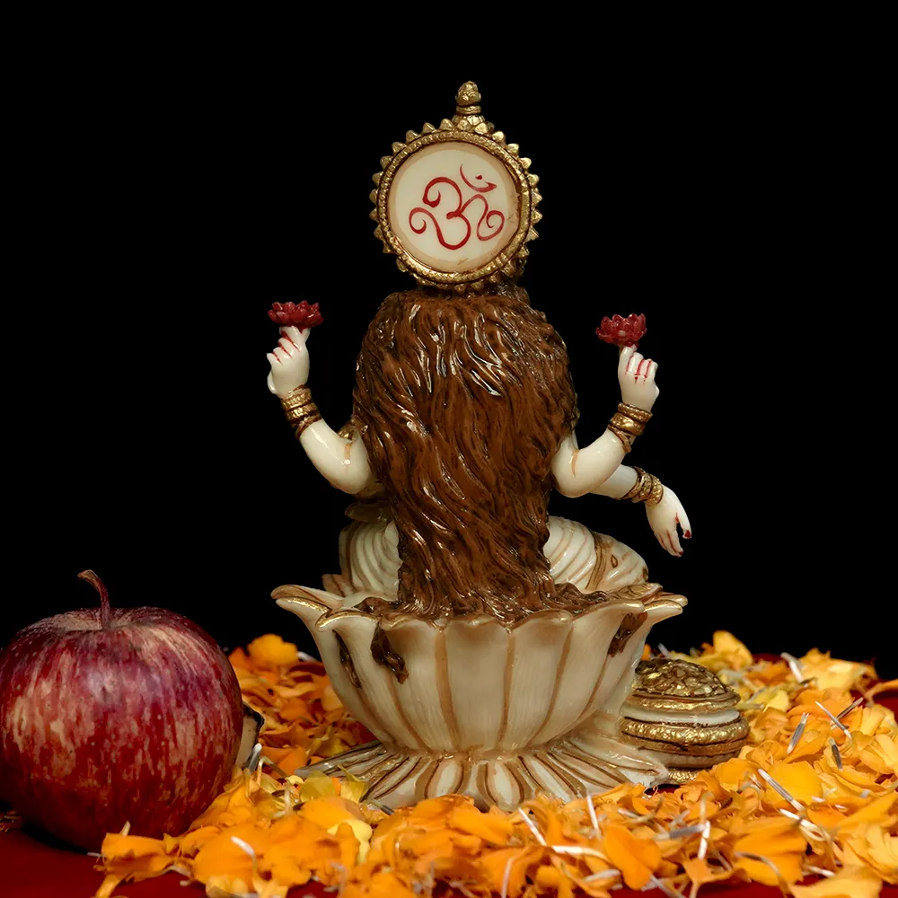 Skillfully Handcrafted Highly Detailed Divine Seated Goddess Laxmi Idol In Polyresin