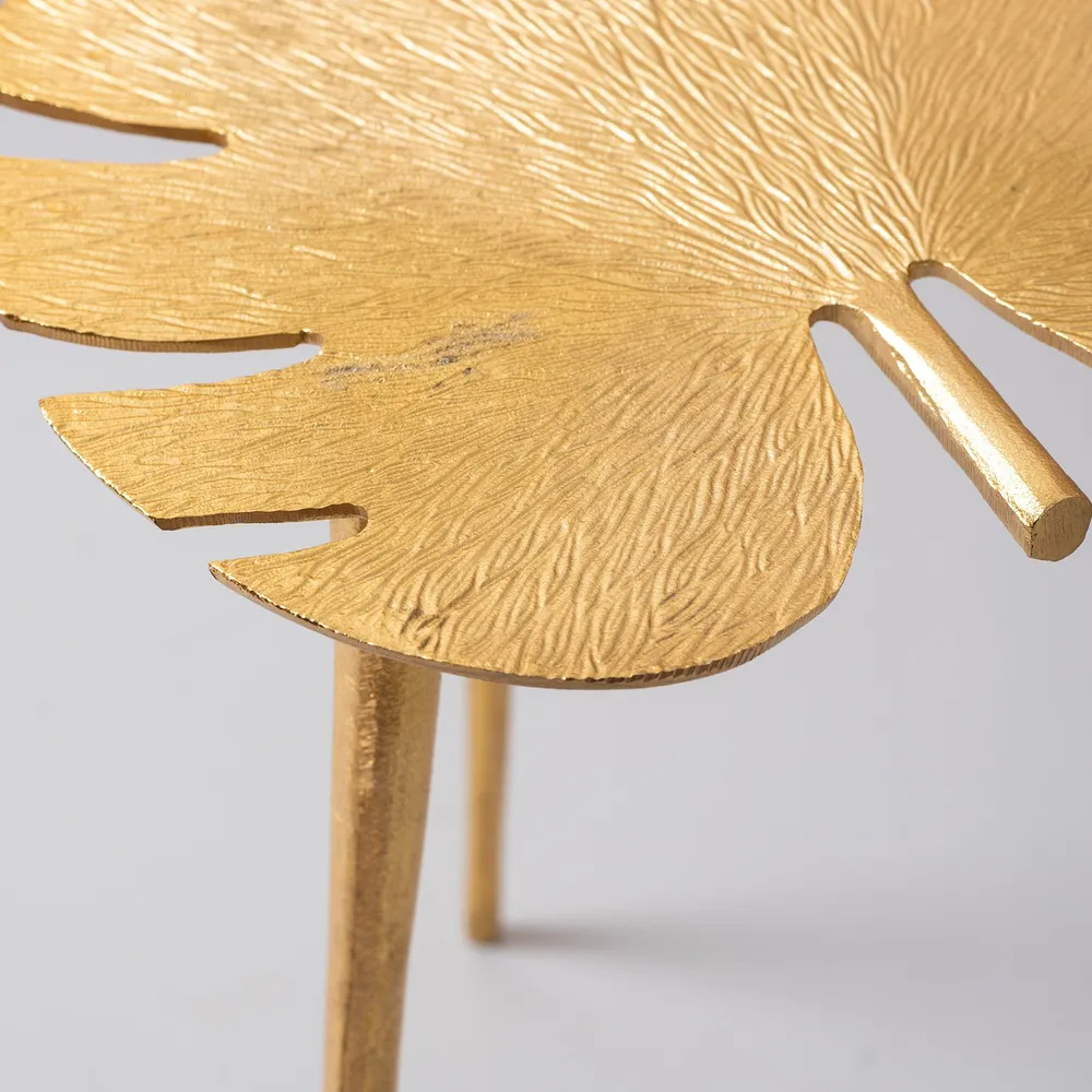 Sleek Leafy Lustrous Gold Colored Aluminum Side Table