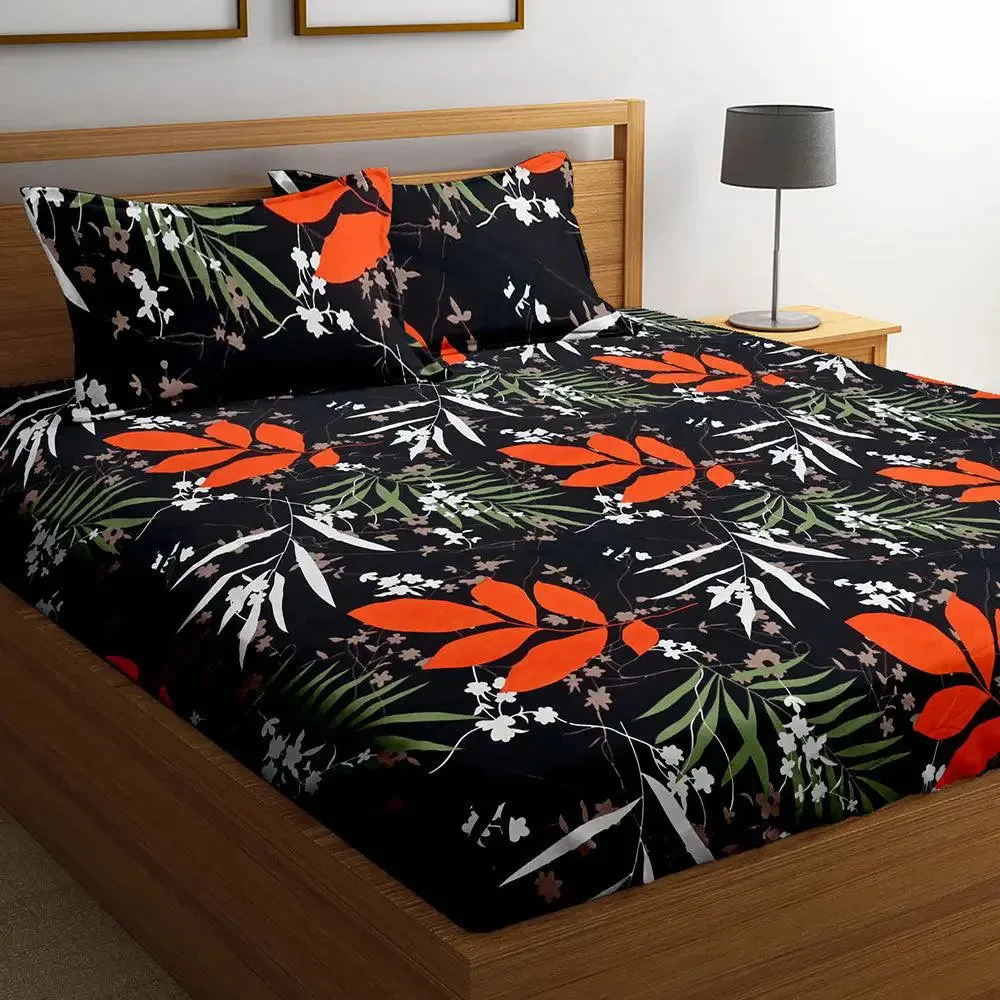 Vibrant Black Orange Leaves Printed Cotton Double Bedsheet With 2 Pillow Covers