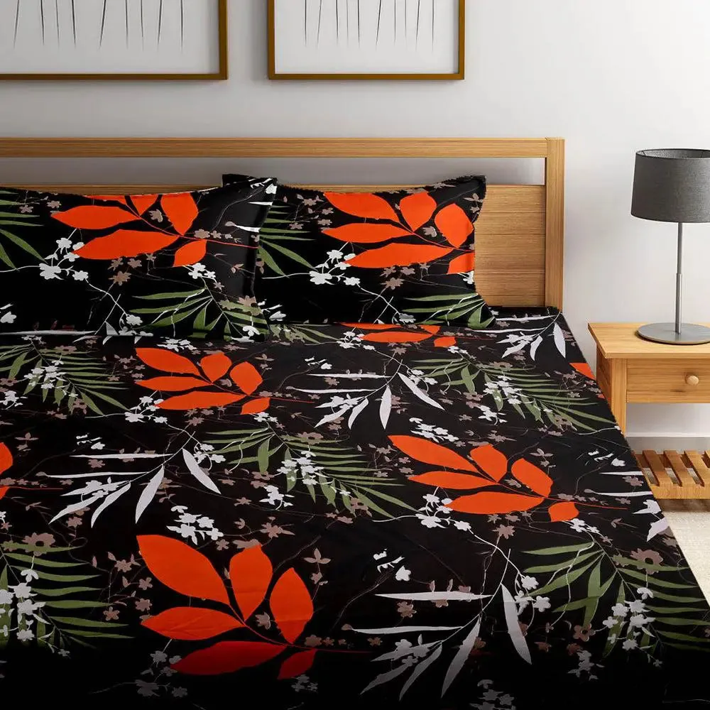 Vibrant Black Orange Leaves Printed Cotton Double Bedsheet With 2 Pillow Covers