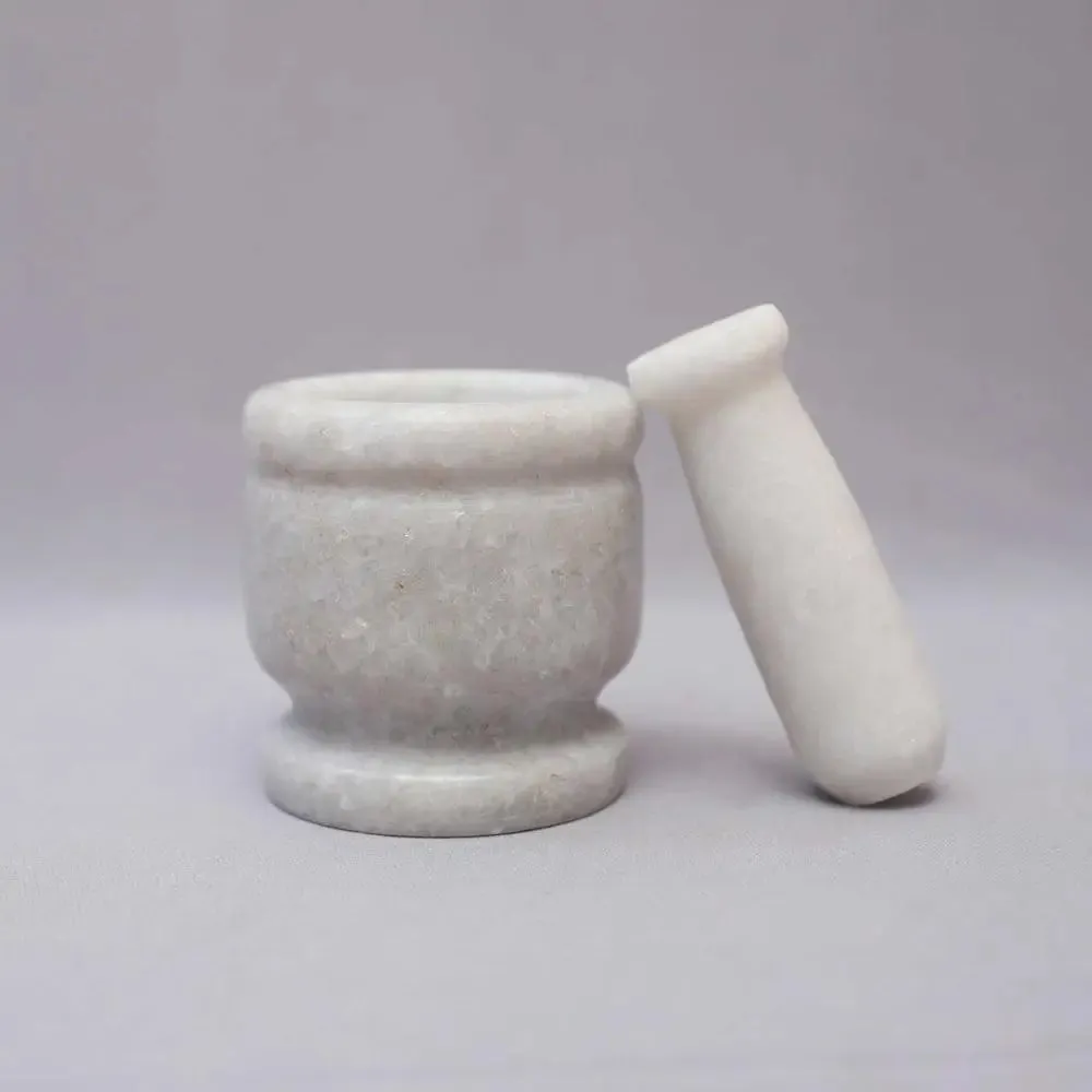 White Marble Black Mortar and Pestle
