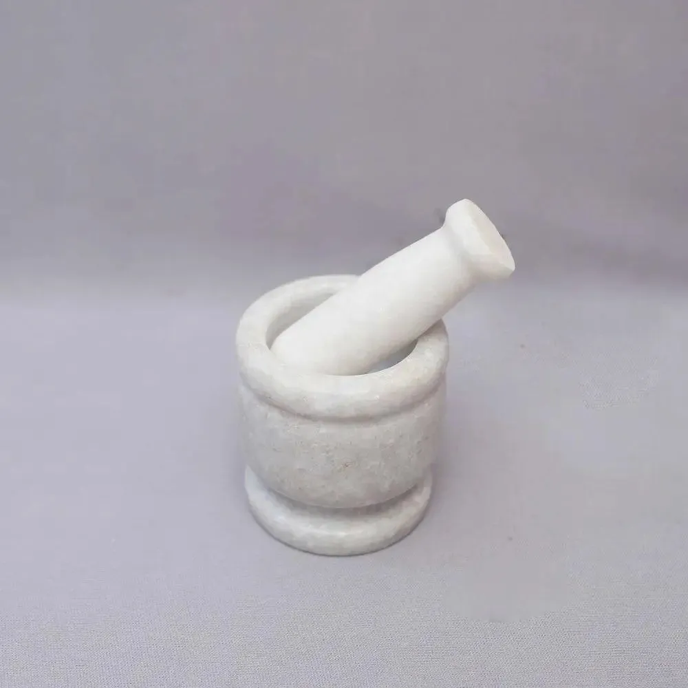 White Marble Black Mortar and Pestle