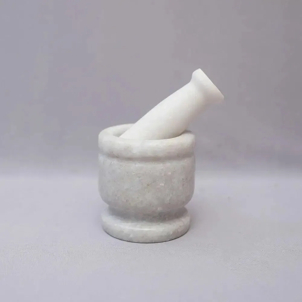 White Marble Black Mortar and Pestle