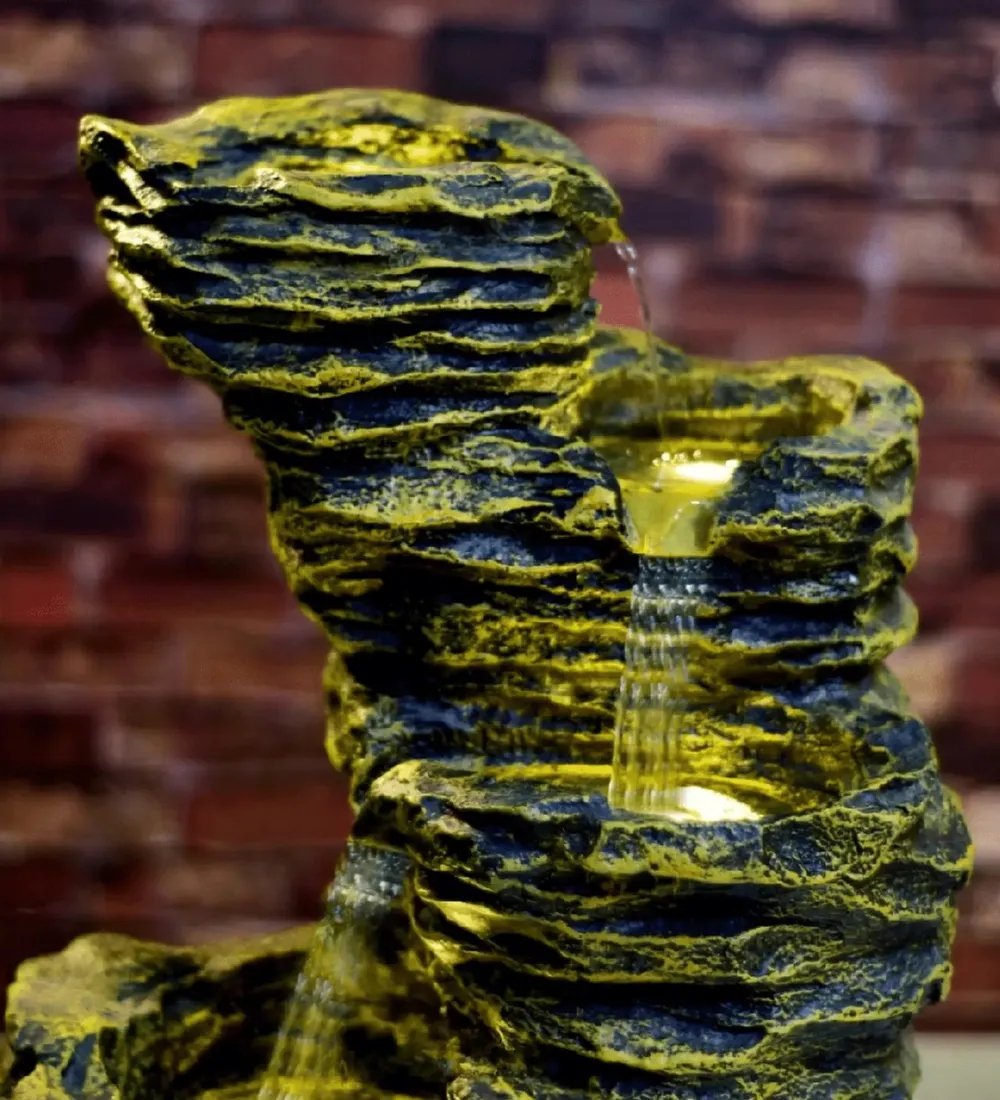Yellow-Coloured Solid Rock Cavern Water Fountain